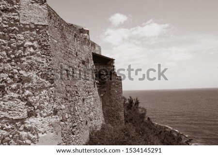 Old style photo of the fortress in Santiago De Cuba