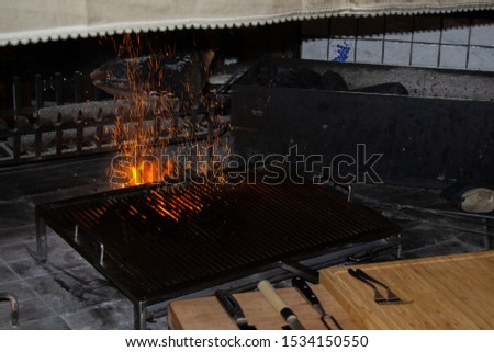sparks from the oven grill in the kitchen