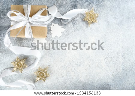 Christmas mood concept. Layout composition with traditional festive attributes, presents in vintage style wrapping. Winter holidays season. Background, copy space, close up, top view, flat lay.