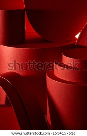 Abstract background composed of primitive volumetric objects of coral and red color