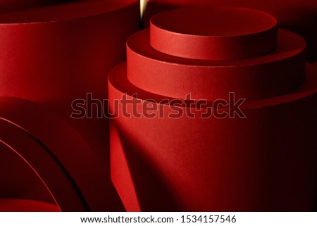 Abstract background composed of primitive volumetric objects of coral and red color