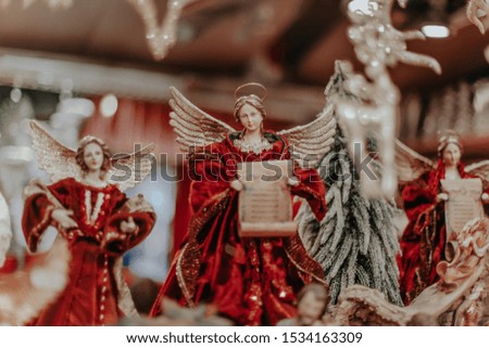 Christmas angels figurines on the Christmas market. Magic atmosphere of Christmas at tyrolean market in the Munich 