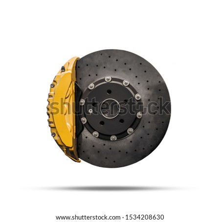 Ceramic disc brake with yellow caliper isolated on a white background