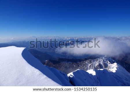 Winter trekking alpinism Grigna Northern Orobie Alps mountain lombardy Italy
