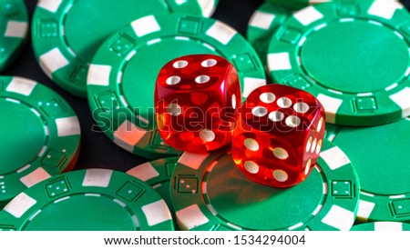 poker chips and old red dices