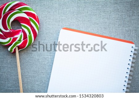 Red Christmas Candy Canes with blank on gray background