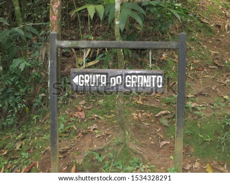 Corredeiras do Alcantilado Park at Visconde de Maua, Resende, State of Rio de Janeiro, Brazil. Gruta do Granito (Granito Cave) direction sign.