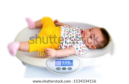 baby health and examination, weight measurement in hospital