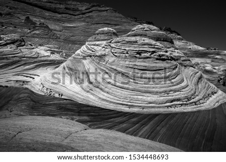 black and white picture of the wave in coyote buttes