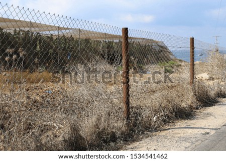fence in a park on the shores of the Mediterranean Sea in Israel