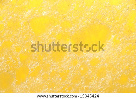 foam seamless texture, yellow sponge, macro.