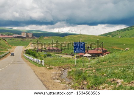 Road sign Kechut and Djermuk. The inscription in Armenian and English. Sunny summer day in nature. Kushchi and Kush-Bilyak, is former village in Vayots Dzor Province of Armenia