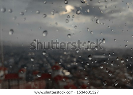 defocused raindrops left on the window