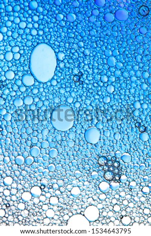 blue drops of water on the glass. background for design