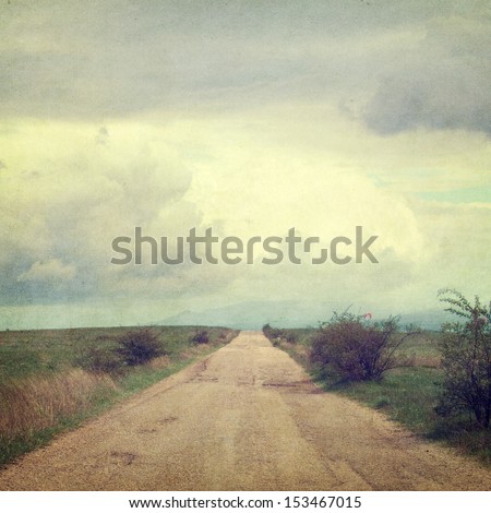 retro style picture with road and clouds