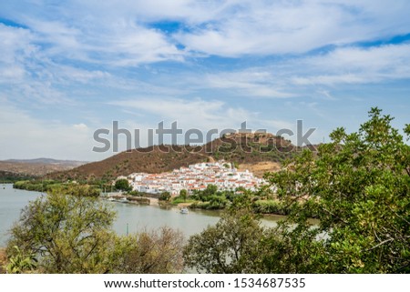 Sanlucar de Guadiana in Spain pictured from portuguese side on the opposite side of Guadiana river, Alcoutim