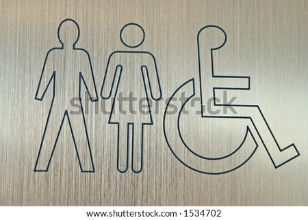metal sign showing accessible washrooms for men and women