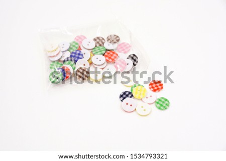 Plastic checkered pattern flat buttons 
