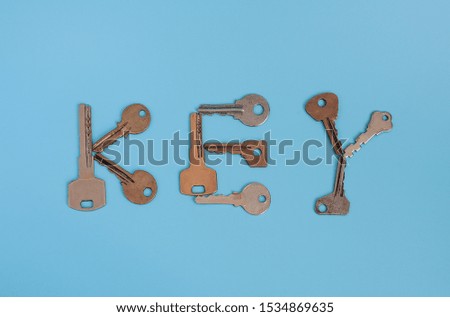 inscription with keys the words key on a blue background
