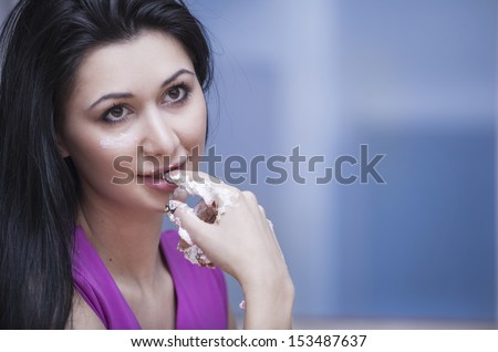 portrait of a girl who eats a Cake
