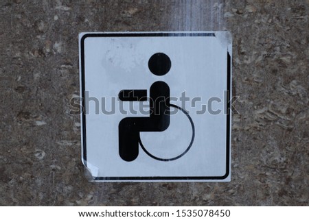 this sign indicates on the glass of the car that the disabled person is driving
