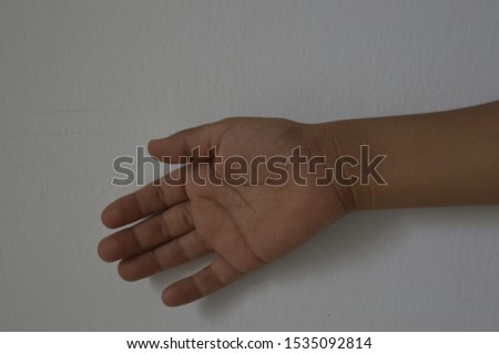 The hands of a small child