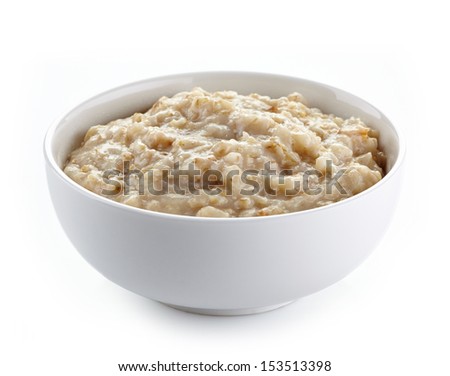 Bowl of oats porridge isolated on a white background. Healthy breakfast Royalty-Free Stock Photo #153513398