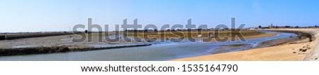 panoramic view of the entrance of the port and the Jacobsen pier of the village of Noirmoutier, on the Atlantic coast in western France