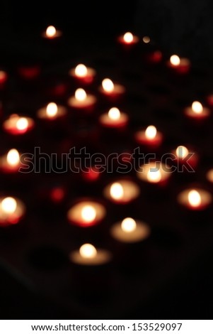 Defocused Candle background. Religion, memory, abstraction.