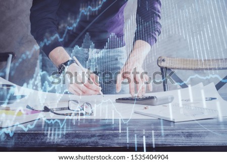 Multi exposure of man standing and planing investment with stock market forex chart.