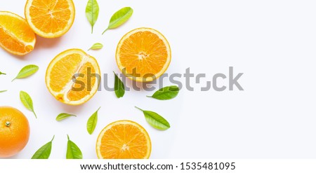 High vitamin C, Juicy and sweet. Fresh orange fruit with green leaves  on white background Royalty-Free Stock Photo #1535481095