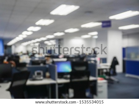 Blurry empty office interiors after working hours