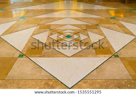 Beautiful marbel floor with symmetrical geometric shapes  Royalty-Free Stock Photo #1535551295