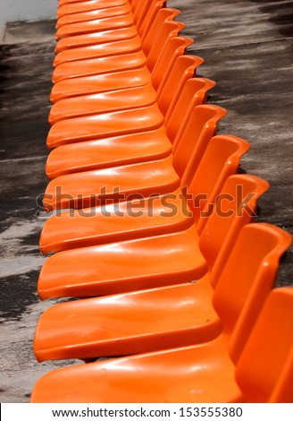 Empty Plastic Chairs at the Stadium