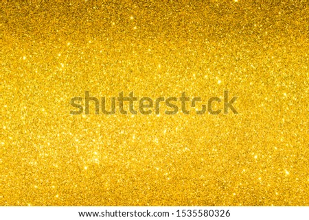 spakle of golden glitter abstract background	