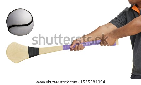 Hurley ball and hurley stick bats isolated on white background. This has clipping path