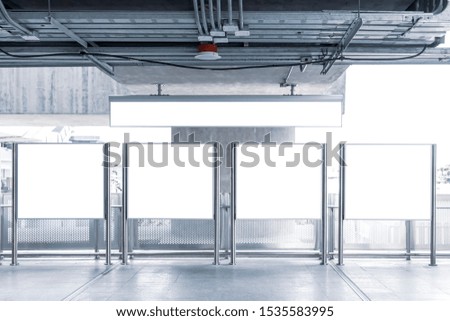 Blank signboard in building train station. It is direction signage mock up for information public transport. Tourists traveling by subway train to get to tourist attractions.