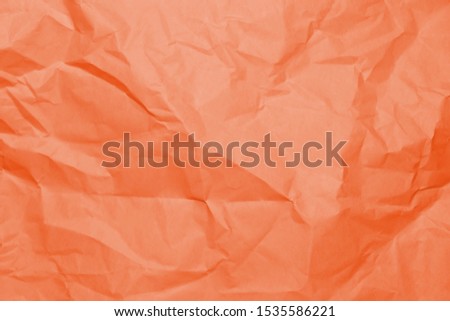 Orange texture of crumpled paper.