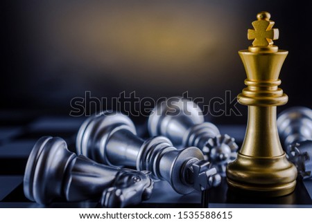 Golden chess arranged in rows with a black background