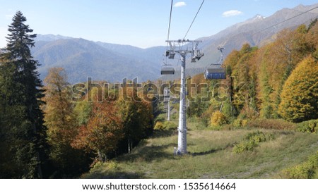 Cable car in the mountains in autumn