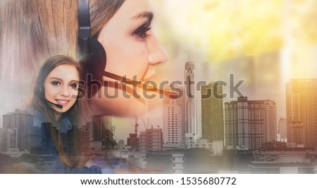 Double exposure Portrait female hotline operators, happy call center service, smiling,answering and telemarketing with hands-free headsets. Cheerful customer service: Work connect cityscape background