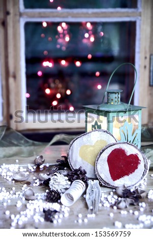 Eve decoration with lantern and romantic hearts