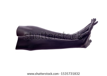 female hands painted in black color isolated on white background