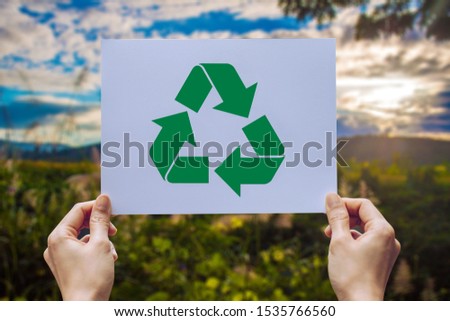 save world ecology concept environmental conservation with hands holding cut out paper recycle showing