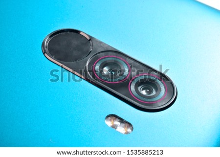 close up  dual lens camera with finger print scanner in smartphone