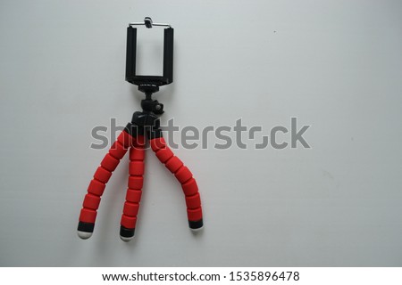 Tripod for phone on a white background.
