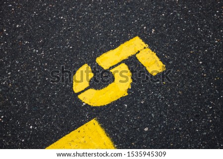 Asphalt abstract background with yellow lines and number one, reviews, race start numver one, DTM, Norisring