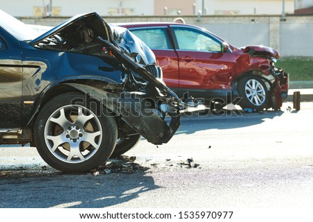 car crash accident on street. damaged automobiles Royalty-Free Stock Photo #1535970977