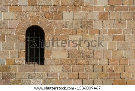 Elements of buildings, texture of the old walls, doors and windows, details of gypsum and stucco. On the streets in Barcelona, ​​public places. Texture background for design.