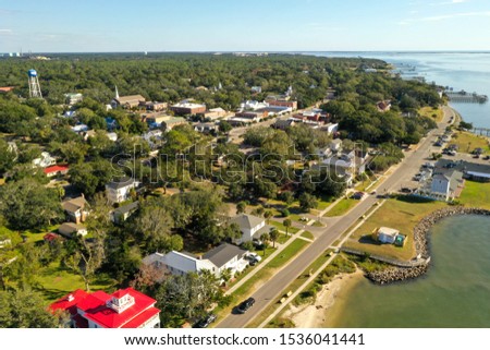 Southport North Carolina water front. Restaurants and a view of downtown. Located on the mouth of the cape fear river. Royalty-Free Stock Photo #1536041441